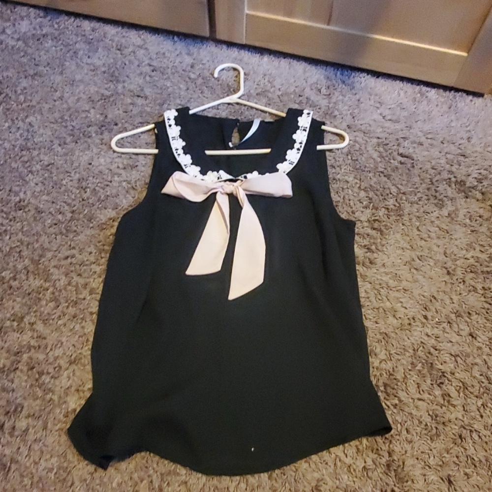 Black blouse with pink bow